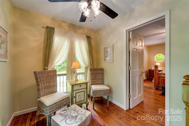 1504 Red Marble Rd, Andrews, NC 28901 - sitting room featuring a ceiling fan, healthy amount of natural light, and wood finished floors