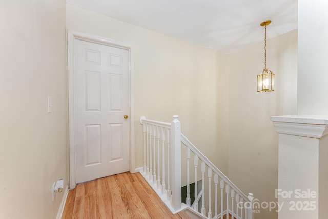 1250 Maple Shade Ln, Charlotte, NC 28270 - hallway with an upstairs landing and wood finished floors