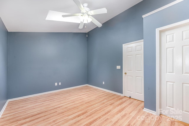 1250 Maple Shade Ln, Charlotte, NC 28270 - unfurnished room featuring ceiling fan, wood finished floors, and a skylight