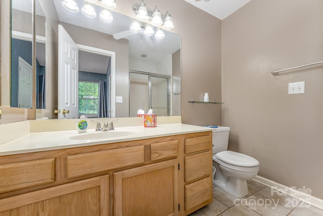 1250 Maple Shade Ln, Charlotte, NC 28270 - bathroom with tile patterned floors, vanity, a stall shower, and a ceiling fan