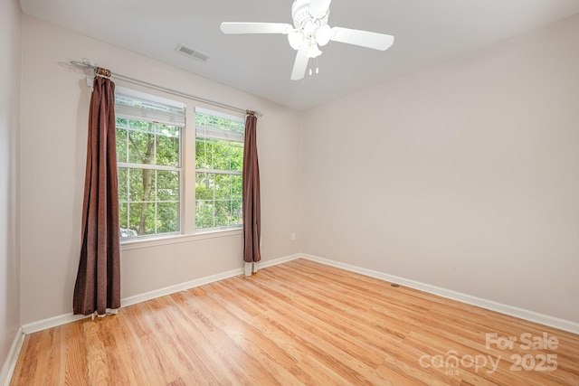 1250 Maple Shade Ln, Charlotte, NC 28270 - spare room with light wood-style floors and a ceiling fan