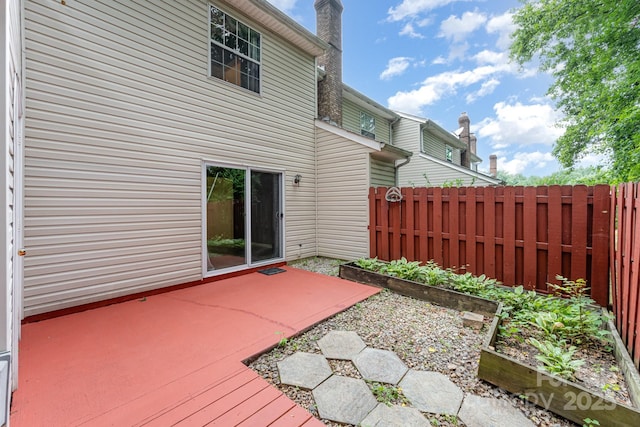 1250 Maple Shade Ln, Charlotte, NC 28270 - wooden deck featuring a vegetable garden and a patio