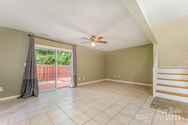 1250 Maple Shade Ln, Charlotte, NC 28270 - unfurnished room featuring ceiling fan, stairs, and light tile patterned floors