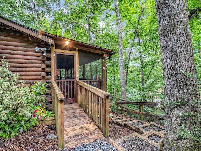 116 Chalet Rd, Lake Lure, NC 28746 - wooden terrace with a sunroom