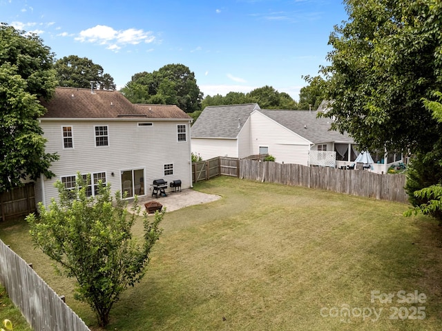 8009 Trotter Rd, Charlotte, NC 28216 - rear view of property featuring a patio and a fenced backyard
