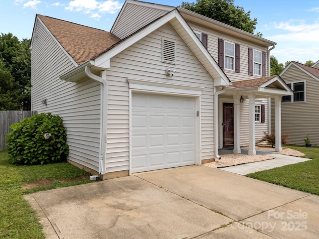8009 Trotter Rd, Charlotte, NC 28216 - traditional-style home with a shingled roof, driveway, and an attached garage