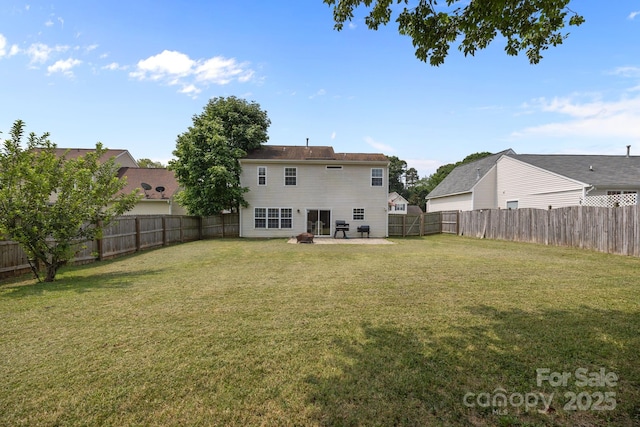 8009 Trotter Rd, Charlotte, NC 28216 - rear view of property featuring a fenced backyard and a patio area