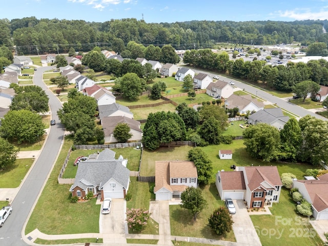 8009 Trotter Rd, Charlotte, NC 28216 - aerial perspective of suburban area with a forest