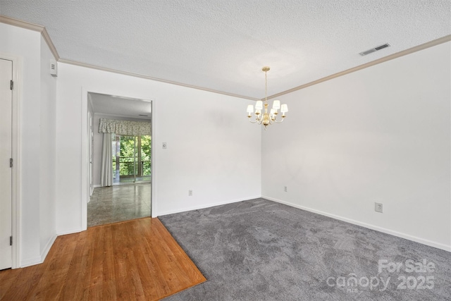 248 Pointe Cir, Rock Hill, SC 29732 - unfurnished room with a chandelier, ornamental molding, a textured ceiling, and wood finished floors
