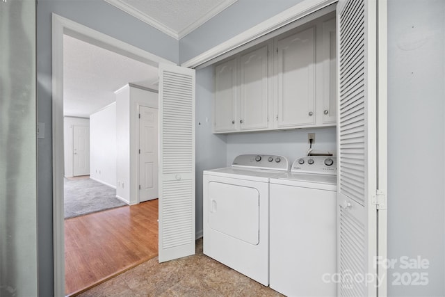 248 Pointe Cir, Rock Hill, SC 29732 - washroom with cabinet space, ornamental molding, washing machine and clothes dryer, and a textured ceiling