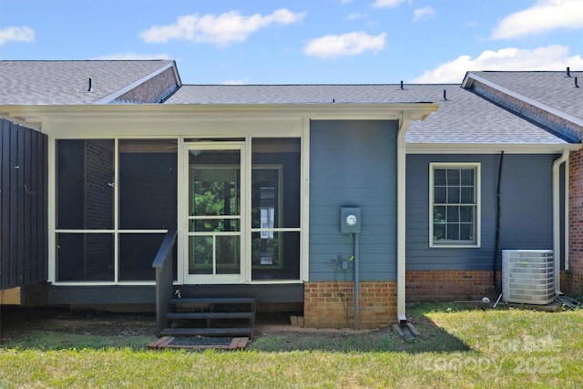 248 Pointe Cir, Rock Hill, SC 29732 - back of house featuring entry steps, a shingled roof, a sunroom, and brick siding