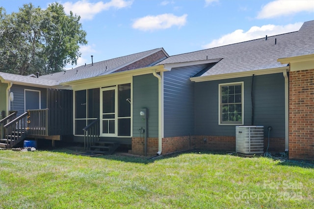 248 Pointe Cir, Rock Hill, SC 29732 - rear view of house with entry steps, a yard, roof with shingles, and a sunroom
