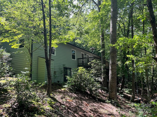 27 Walker Cove Rd, Black Mountain, NC 28711 - view of side of home with a wooden deck and a view of trees