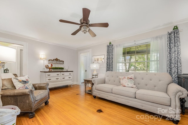 57 Patton Ct SE, Concord, NC 28025 - living room featuring crown molding, a ceiling fan, and wood finished floors
