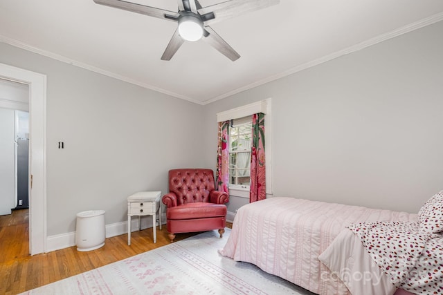 57 Patton Ct SE, Concord, NC 28025 - bedroom featuring wood finished floors, ornamental molding, and ceiling fan