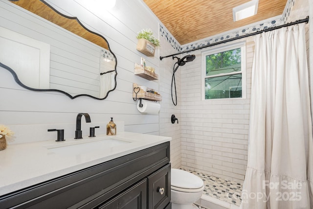 57 Patton Ct SE, Concord, NC 28025 - full bathroom featuring vanity, a tile shower, and wooden ceiling