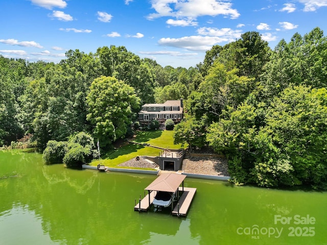 7040 Hyde St, Sherrills Ford, NC 28673 - aerial view of property and surrounding area featuring a nearby body of water and a heavily wooded area