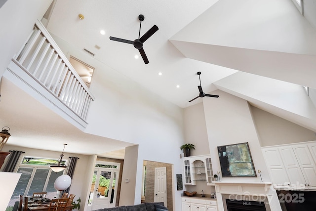 7040 Hyde St, Sherrills Ford, NC 28673 - living room featuring ceiling fan, high vaulted ceiling, and recessed lighting
