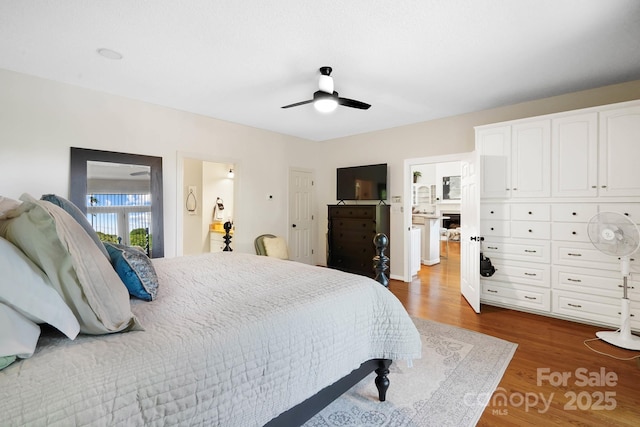 7040 Hyde St, Sherrills Ford, NC 28673 - bedroom with wood finished floors and ceiling fan