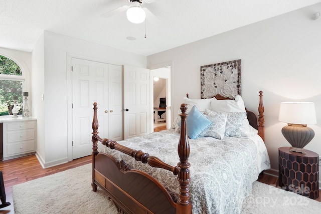 7040 Hyde St, Sherrills Ford, NC 28673 - bedroom featuring wood finished floors, a closet, and a ceiling fan