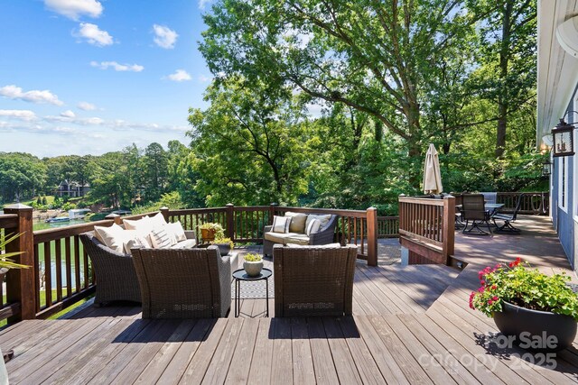 7040 Hyde St, Sherrills Ford, NC 28673 - wooden deck featuring an outdoor hangout area and outdoor dining space