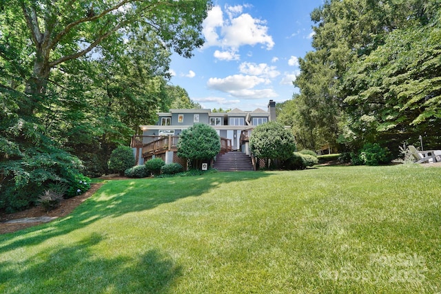 7040 Hyde St, Sherrills Ford, NC 28673 - view of green lawn featuring a wooden deck and stairway