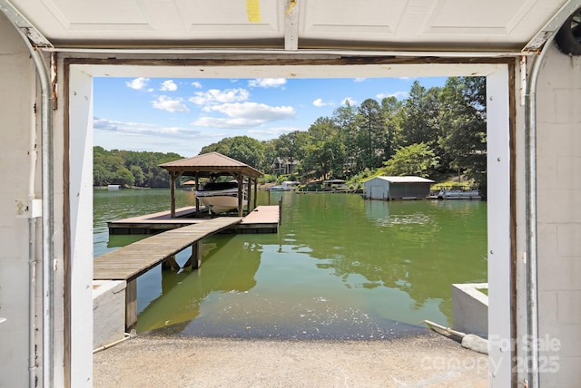 7040 Hyde St, Sherrills Ford, NC 28673 - dock featuring a water view, view of wooded area, and boat lift