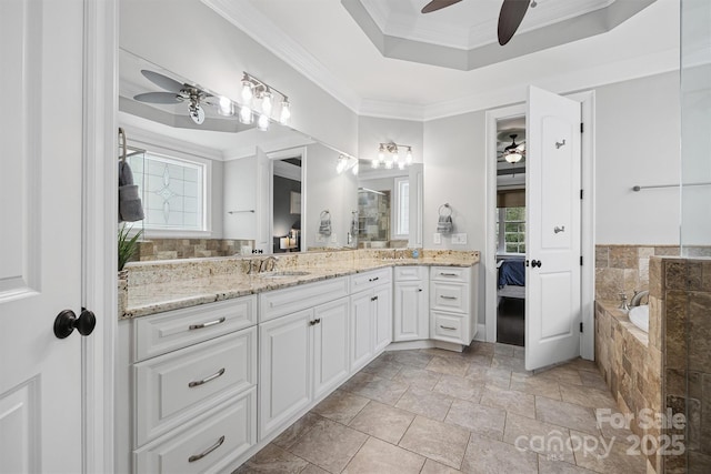 835 Misty Arbor Frd Unit 76, Clover, SC 29710 - ensuite bathroom featuring ceiling fan, healthy amount of natural light, vanity, a garden tub, and ornamental molding