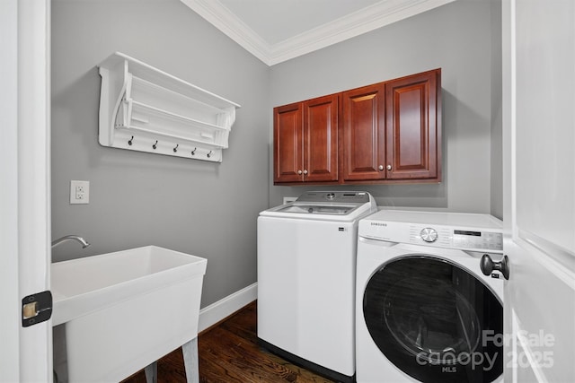 835 Misty Arbor Frd Unit 76, Clover, SC 29710 - laundry room featuring cabinet space, crown molding, washing machine and dryer, and dark wood-type flooring