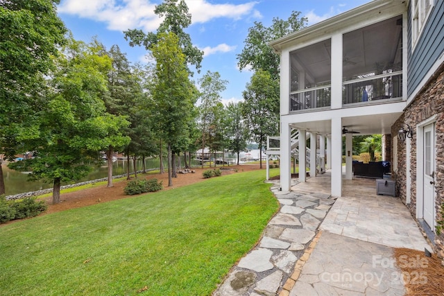 835 Misty Arbor Frd Unit 76, Clover, SC 29710 - view of green lawn featuring a patio area and ceiling fan