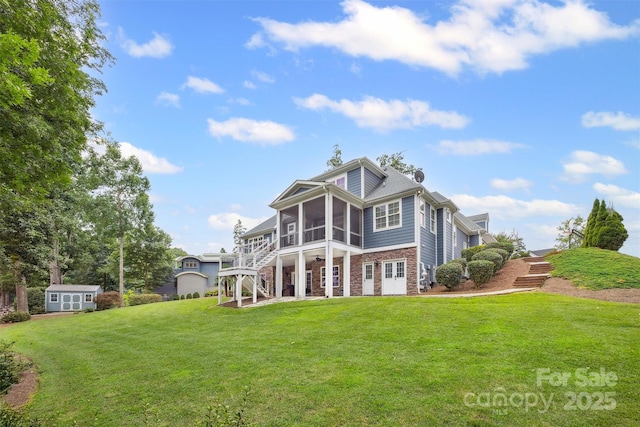 835 Misty Arbor Frd Unit 76, Clover, SC 29710 - back of house with a sunroom, stairs, a storage unit, a yard, and brick siding
