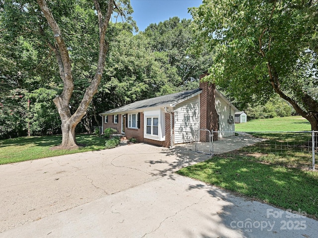 159 Valleydale Dr, Gastonia, NC 28056 - single story home featuring a chimney, a storage shed, brick siding, and a gate