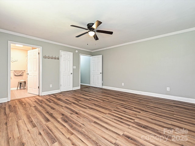 159 Valleydale Dr, Gastonia, NC 28056 - unfurnished bedroom with wood finished floors, crown molding, ensuite bath, and a ceiling fan