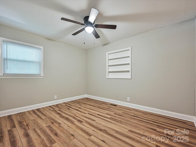 159 Valleydale Dr, Gastonia, NC 28056 - empty room with wood finished floors and ceiling fan