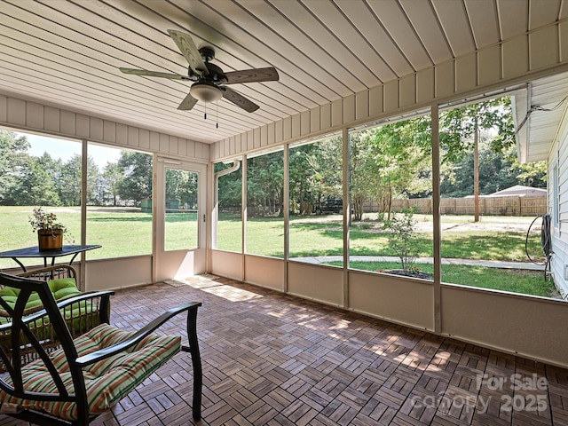 159 Valleydale Dr, Gastonia, NC 28056 - unfurnished sunroom featuring ceiling fan and view of scattered trees