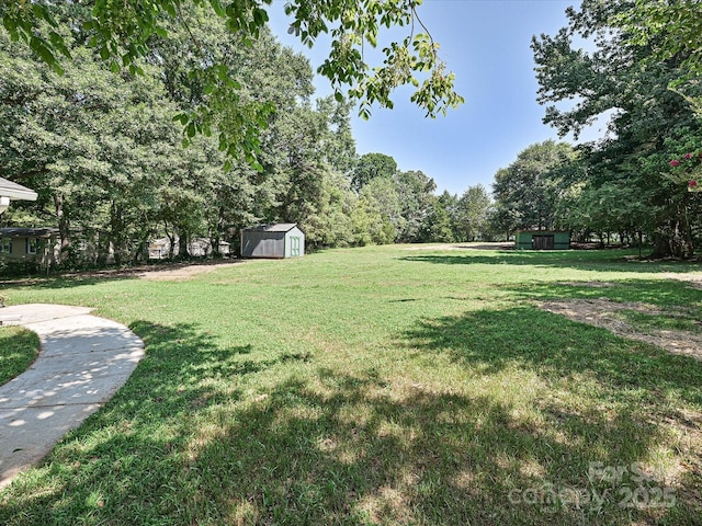 159 Valleydale Dr, Gastonia, NC 28056 - view of grassy yard with a shed