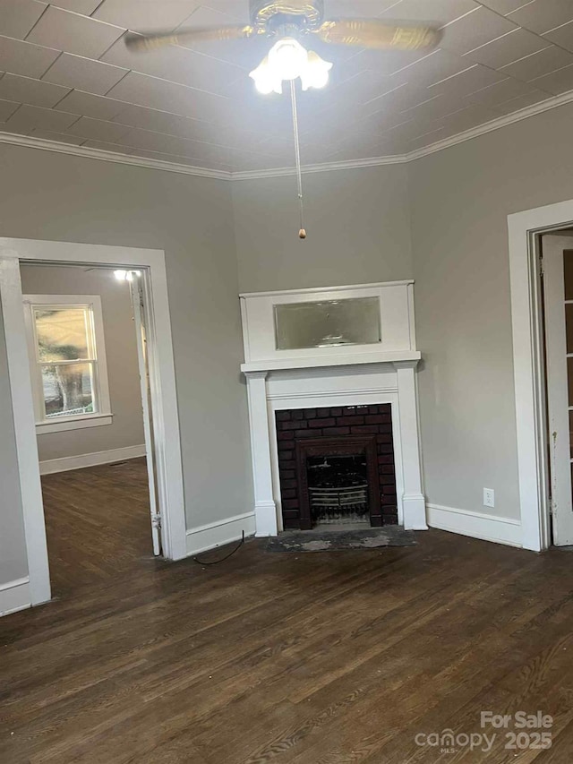 325 N Caldwell Ave, Newton, NC 28658 - unfurnished living room with wood finished floors, crown molding, and a fireplace with flush hearth