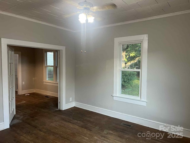 325 N Caldwell Ave, Newton, NC 28658 - spare room featuring ornamental molding, plenty of natural light, ceiling fan, and dark wood-style floors
