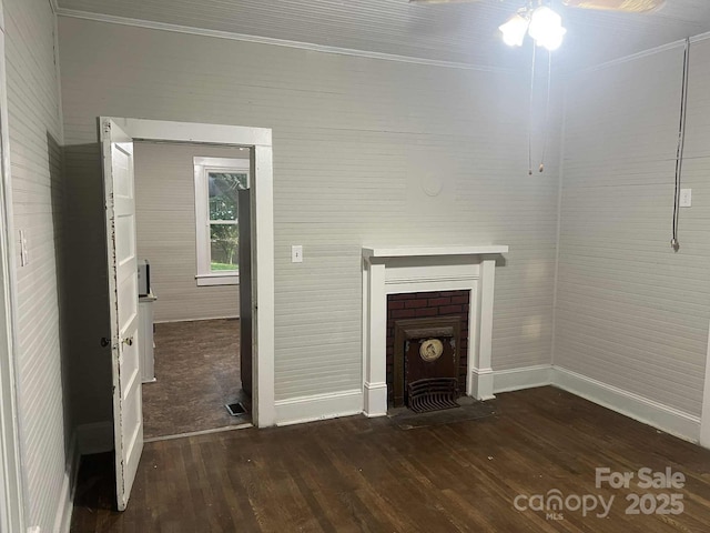 325 N Caldwell Ave, Newton, NC 28658 - unfurnished living room with wood finished floors, ceiling fan, a fireplace, and ornamental molding