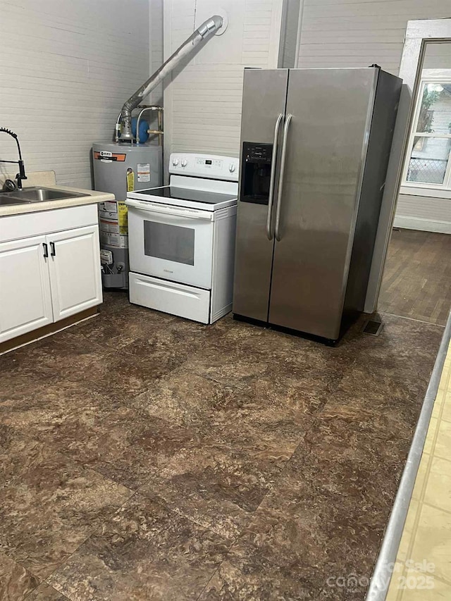 325 N Caldwell Ave, Newton, NC 28658 - kitchen with stainless steel fridge with ice dispenser, white electric stove, water heater, and white cabinetry