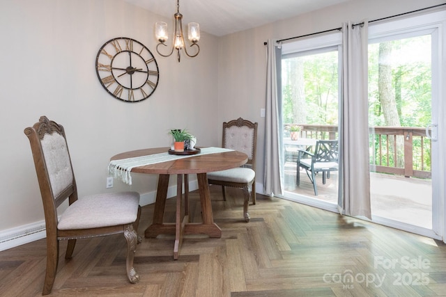 14 New Bern Dr, Fletcher, NC 28732 - dining area featuring a chandelier and baseboards