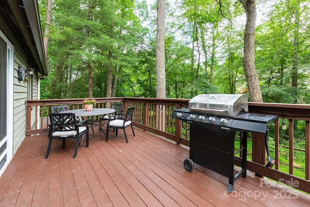 14 New Bern Dr, Fletcher, NC 28732 - deck featuring area for grilling, outdoor dining space, and view of wooded area