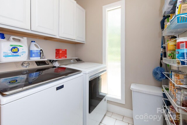 14 New Bern Dr, Fletcher, NC 28732 - laundry area with separate washer and dryer, cabinet space, and light tile patterned flooring