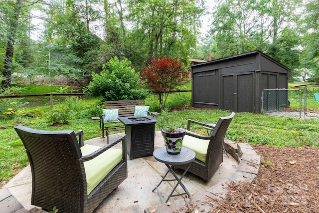 14 New Bern Dr, Fletcher, NC 28732 - view of patio featuring a storage unit and an outdoor fire pit
