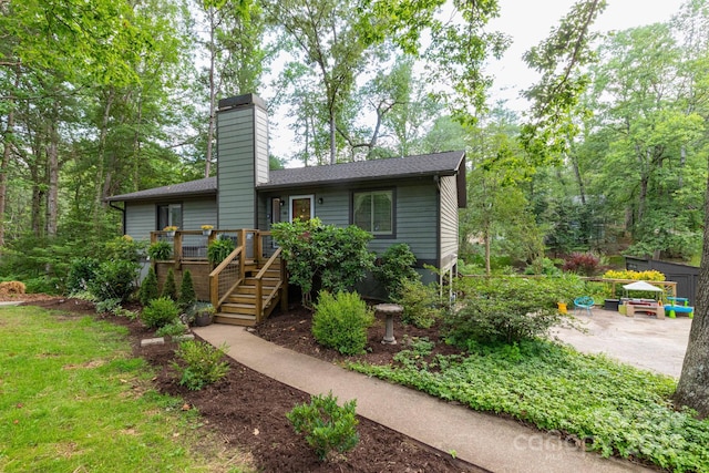 14 New Bern Dr, Fletcher, NC 28732 - view of front facade featuring stairway, a chimney, a deck, and a shingled roof
