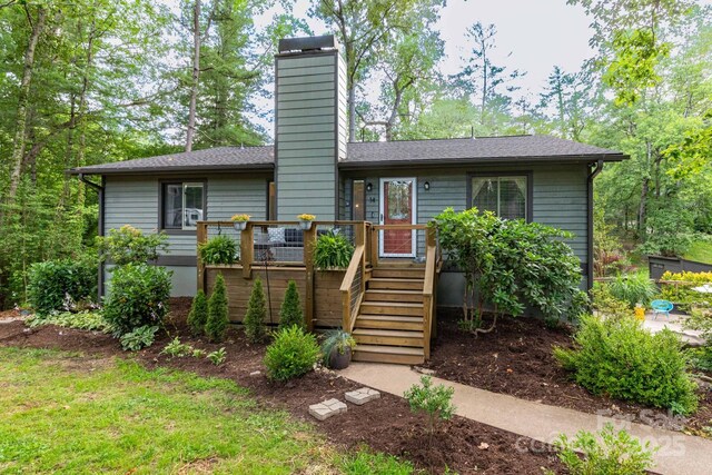 14 New Bern Dr, Fletcher, NC 28732 - view of front of house with a chimney and a deck