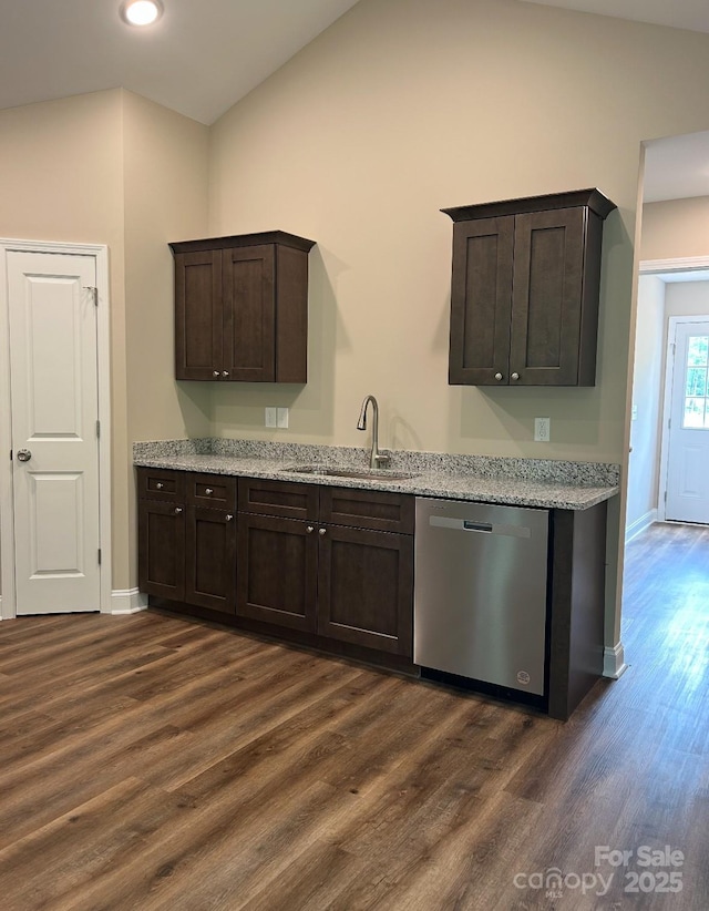 32967 Poplar Lane Rd, Albemarle, NC 28001 - kitchen featuring stainless steel dishwasher, dark wood-style floors, dark brown cabinets, light stone counters, and lofted ceiling