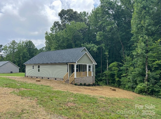 32967 Poplar Lane Rd, Albemarle, NC 28001 - view of front of home with crawl space, covered porch, a shingled roof, and a front yard