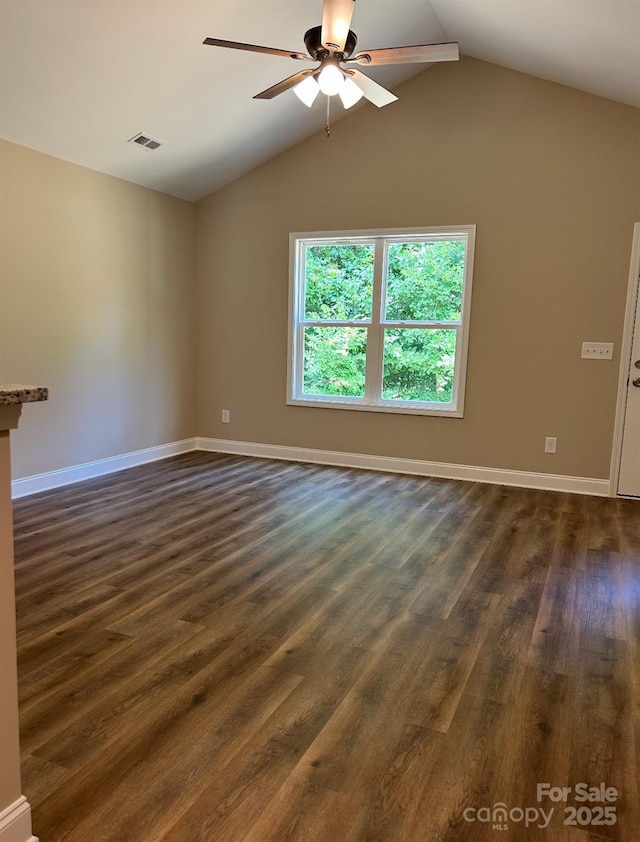 32967 Poplar Lane Rd, Albemarle, NC 28001 - unfurnished room with ceiling fan, dark wood-type flooring, and lofted ceiling