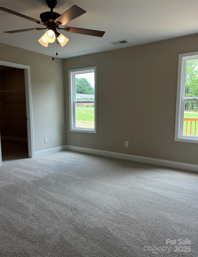 32967 Poplar Lane Rd, Albemarle, NC 28001 - carpeted empty room featuring ceiling fan and baseboards